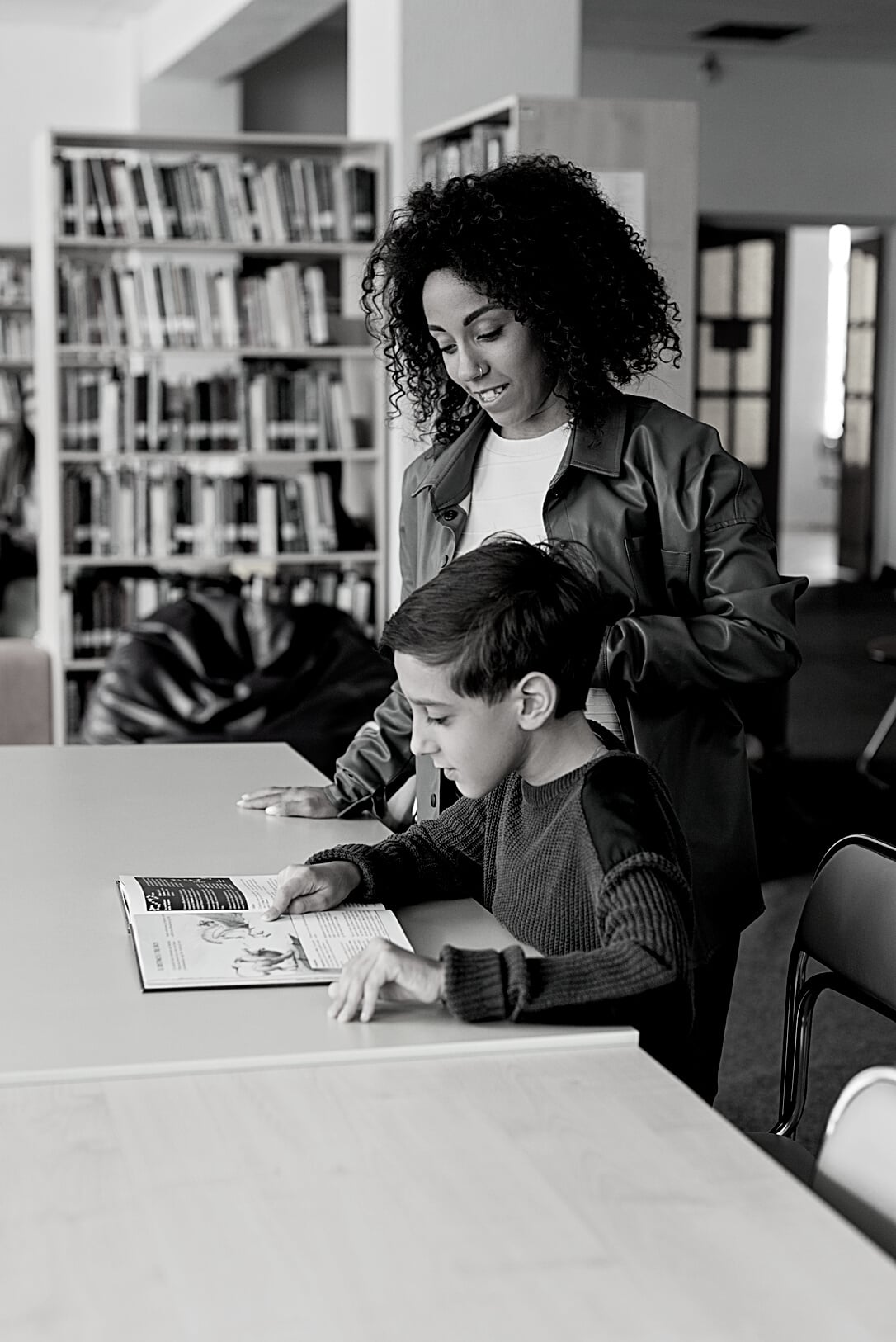 Teacher and Student in a Library